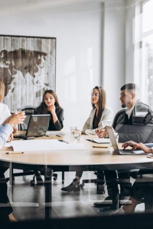 Group of people working out business plan in an office